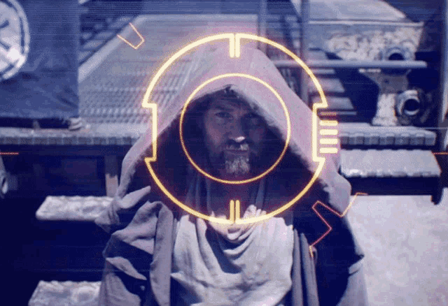 a man in a hooded robe with a circle around his face