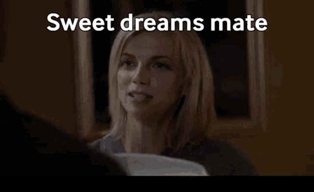 a woman is looking at a man with the words sweet dreams mate below her