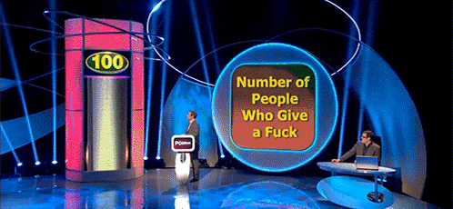 two men on a game show with the words number of people who give a fuck