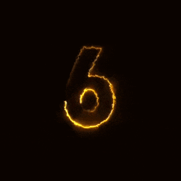the number 6 is glowing brightly on a dark background