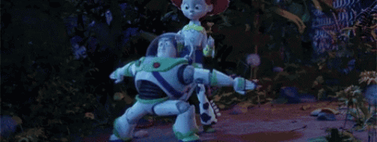 buzz lightyear and jessie from toy story are dancing together in the woods .