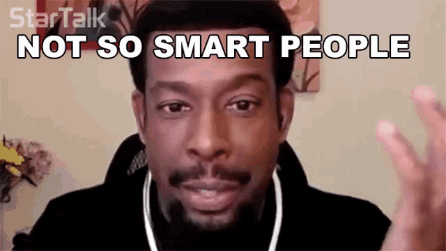 a man says " not so smart people " in front of a picture of flowers