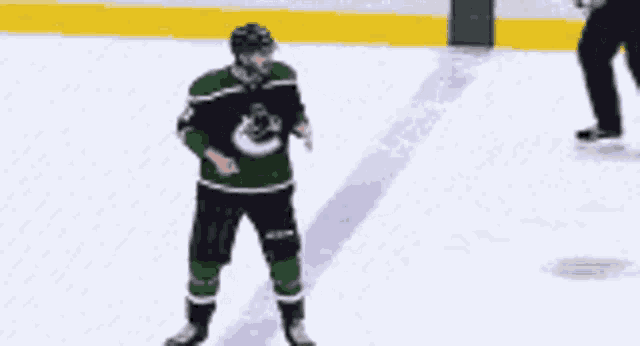 a hockey player with the number 18 on their jersey
