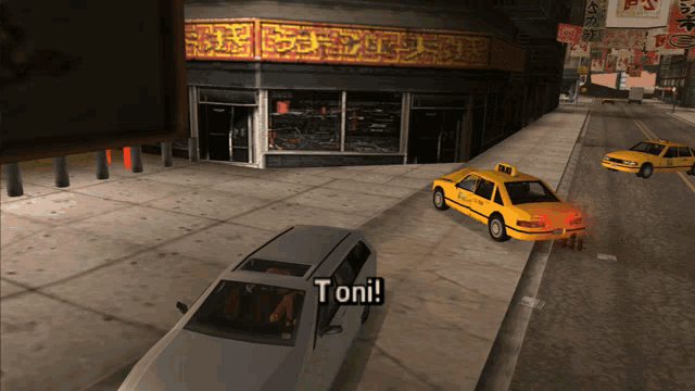 a video game scene with a taxi that says toni on the side