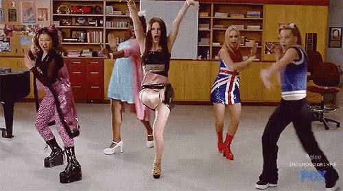 a group of girls are dancing in a room with a fox logo in the corner .