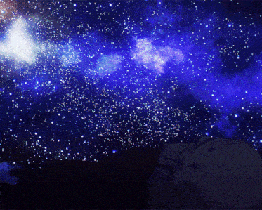 a person looking up at a starry night sky with the word galaxy visible
