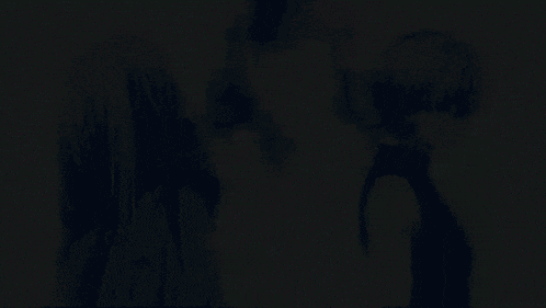a couple of anime characters standing back to back with a blue background