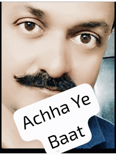 a close up of a man 's face with the words achha ye baat on it