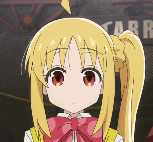 a close up of a girl 's face with a sign in the background that says ' tarr '
