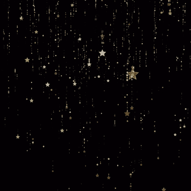 a black background with gold stars falling from it