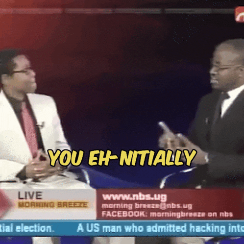 two men are sitting in front of a screen that says you eh-nitially
