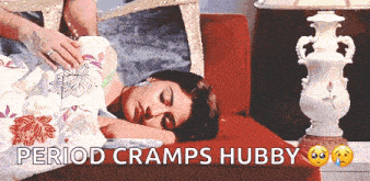 a woman is laying on a couch with the words " period cramps hubby " above her