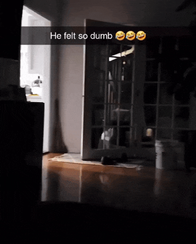 a snapchat of a person standing in a dark room with the caption " he felt so dumb "