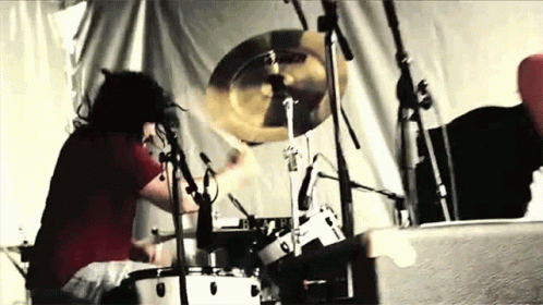 Im Looking Back Drummer GIF - Im Looking Back Drummer Party Rock GIFs