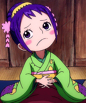 a little girl with purple hair is wearing a green kimono and a pink flower in her hair