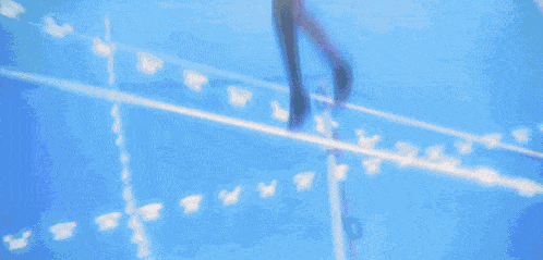 a person is dancing on a stage in a blurry picture .