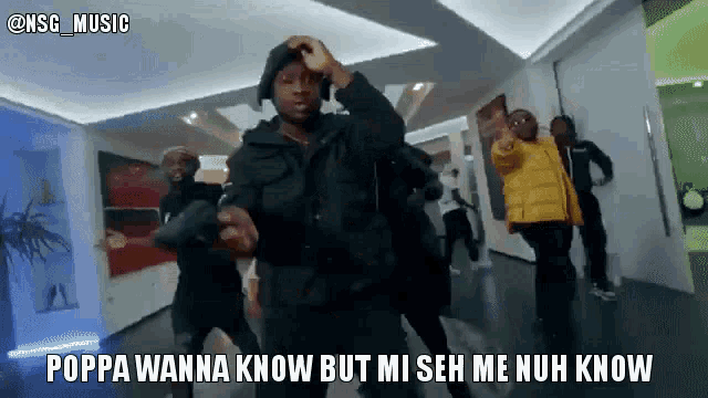 a group of men are dancing in a room with the caption poppa wanna know but miseh me nuh know .