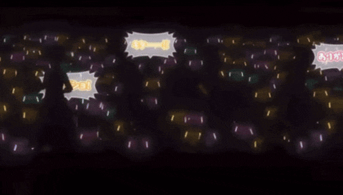 a group of anime characters are standing on a stage in a spotlight .