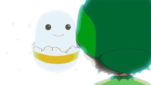a person in a green hat is looking at a white egg with a yellow stripe on it