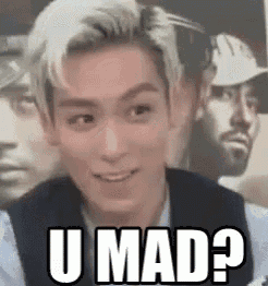 a man is making a funny face and says `` u mad '' .