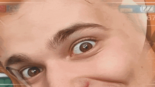 a close up of a person 's face with the number 456 on the bottom