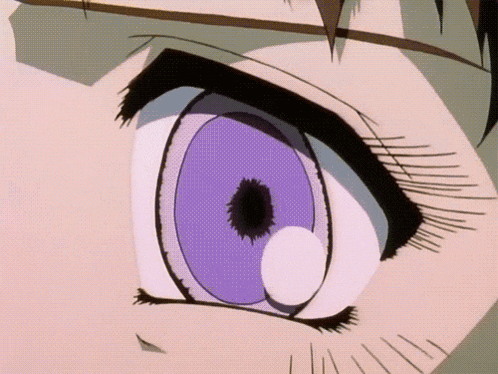a close up of a person 's eye with a purple iris