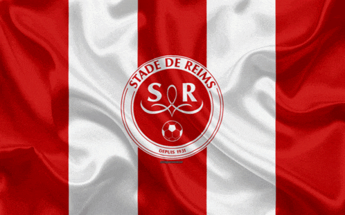 a red and white striped flag with the stade de reims logo on it