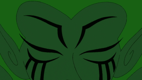 a close up of a cartoon character 's eyes that are green