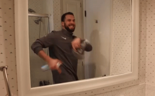 Wiping Mirror Cleaning GIF - Wiping Mirror Cleaning Spray GIFs