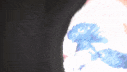a blurred image of a person 's head with a blue and white design