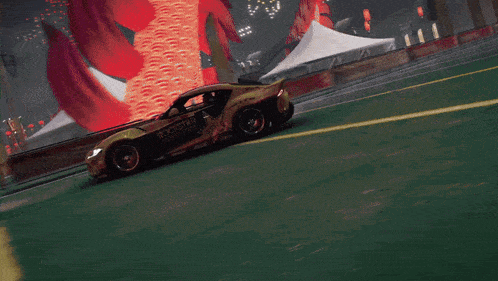 a rockstar energy drink car driving down a track
