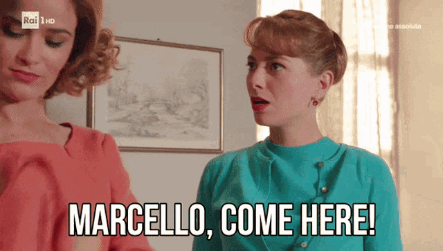 two women standing next to each other with the words marcello come here on the screen