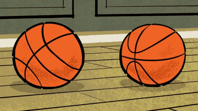 two orange basketballs on a wooden floor in a cartoon