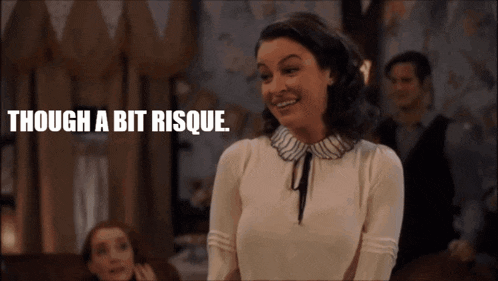 a woman is smiling with the words though a bit risque