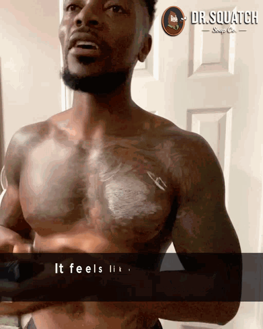 a shirtless man is applying lotion to his chest and says it feels like dr. squatch
