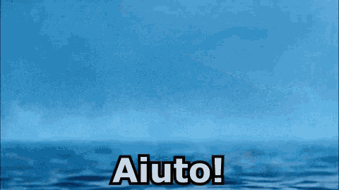 a person is swimming in the ocean with the words aiuto written on the screen