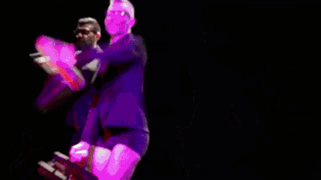 a man in a suit and tie is throwing papers in the air .