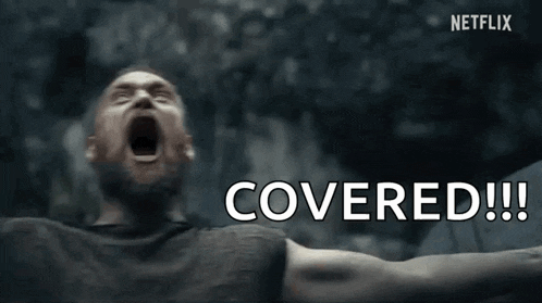 a man is screaming with his mouth open and the word covered is written above him .