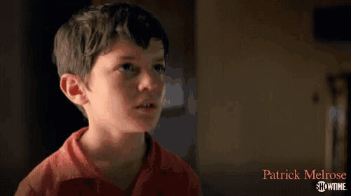 a young boy with patrick melrose showtime on the bottom