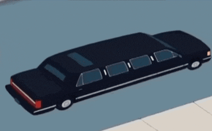 a black limousine is parked on a sidewalk