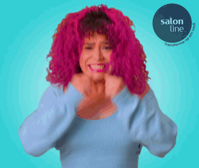a woman with pink hair has a salon line logo in the background