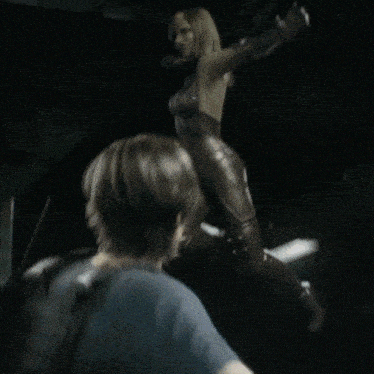 a blurry picture of a man and a woman in a dark room