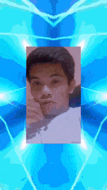 a picture of a man in a white shirt is surrounded by blue lights
