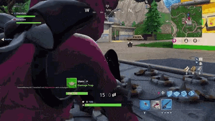 a screenshot of a video game shows a purple character with a damage trap item