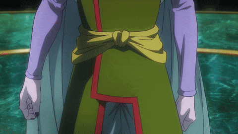 a close up of a person 's torso with a purple shirt and a green dress