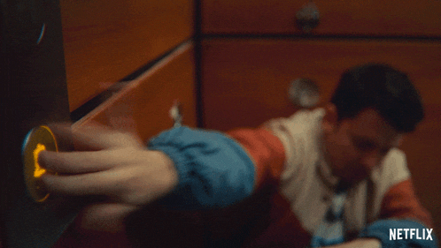 a netflix ad shows a man reaching out towards another person