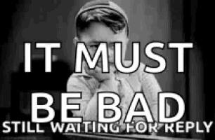 a black and white photo of a boy with the words it must be bad still waiting for reply .