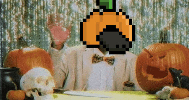 a man with a pumpkin on his head is surrounded by pumpkins and a skull