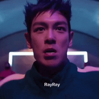 a close up of a man 's face with the word rayray written below him