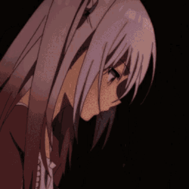 a close up of a girl 's face with white hair